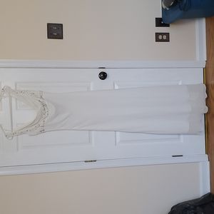 Beautify long white dress with sequins and beaded accents